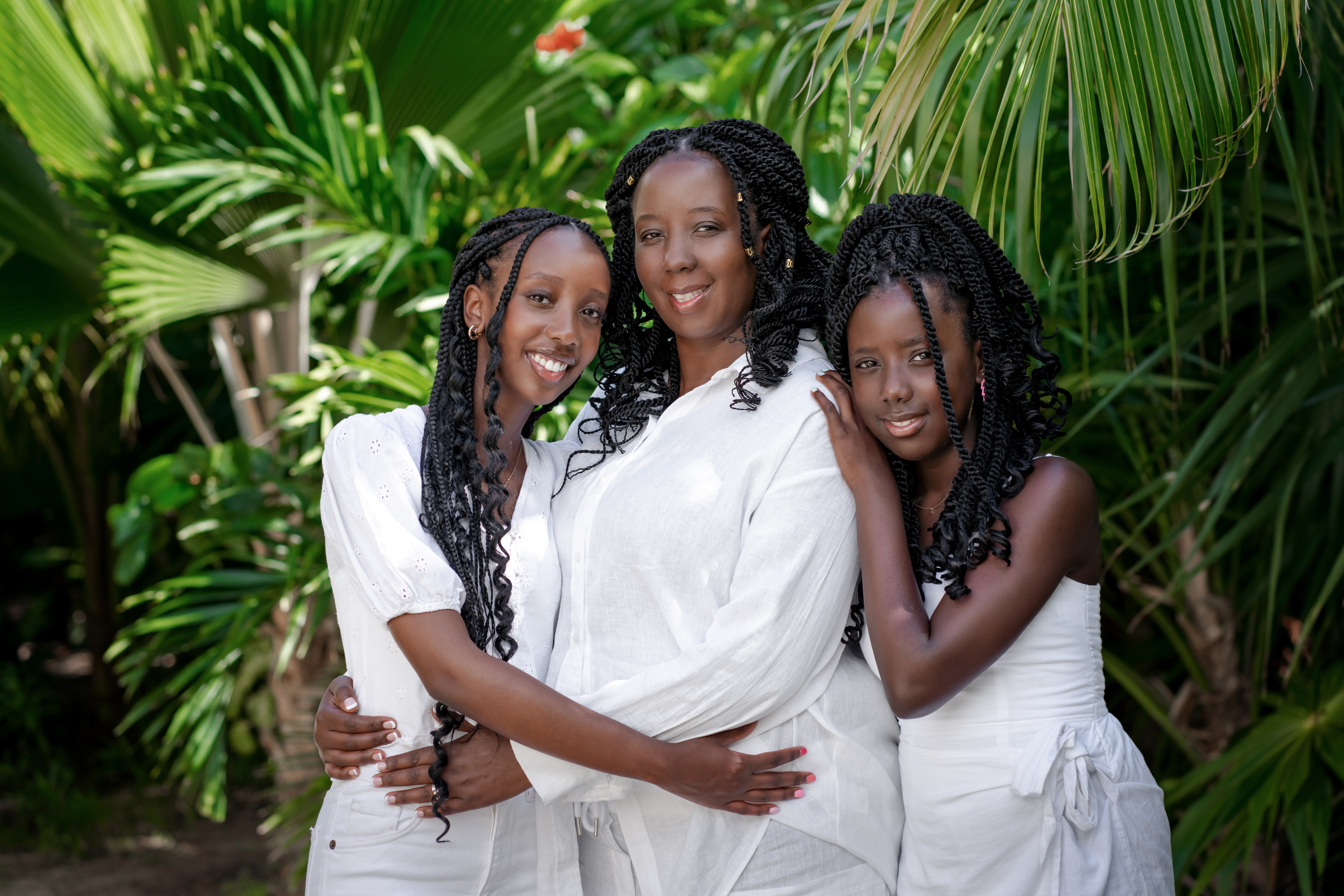 Mother with daughters at luxury resort family session